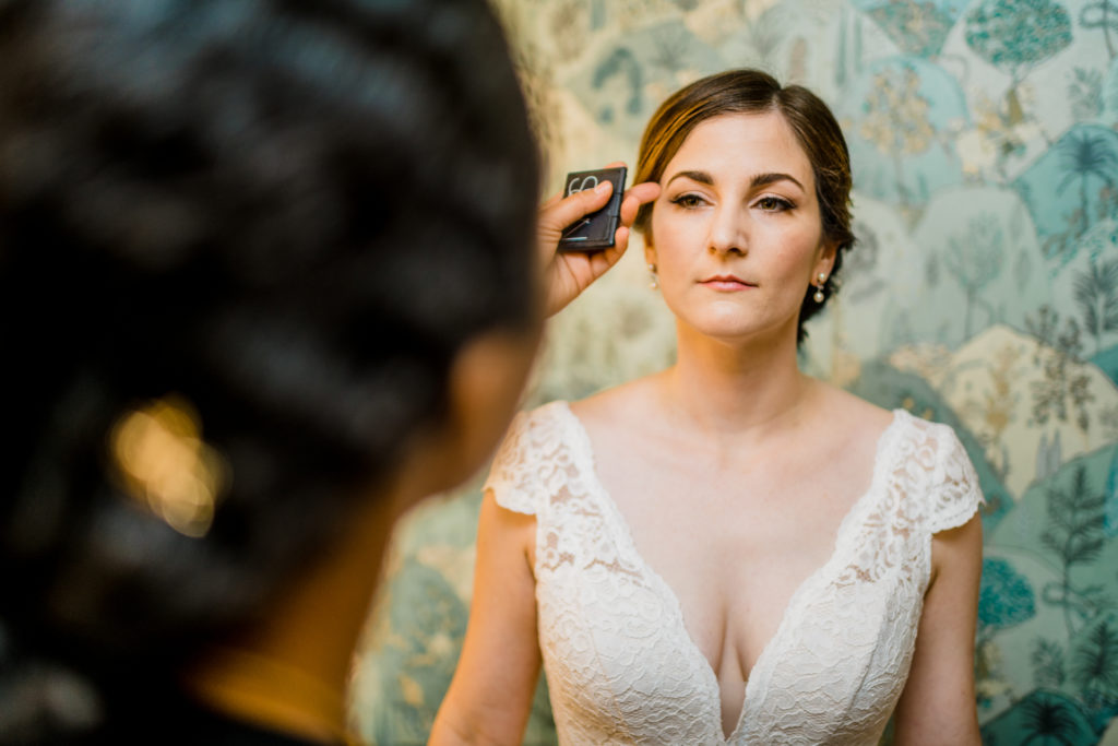 Virginia hairstylist and makeup artist working on a bride