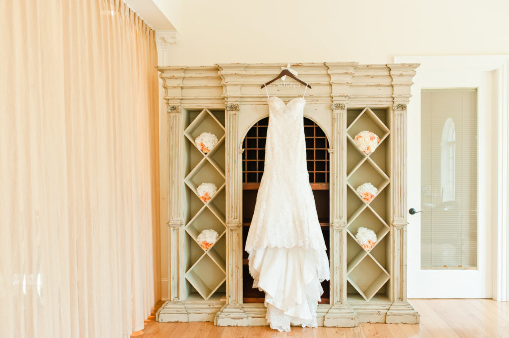 wedding dress hanging at Morais Vineyards balcony