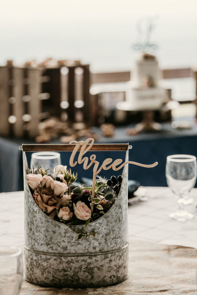 wedding reception centerpiece potted Ivy and copper & wooden accents