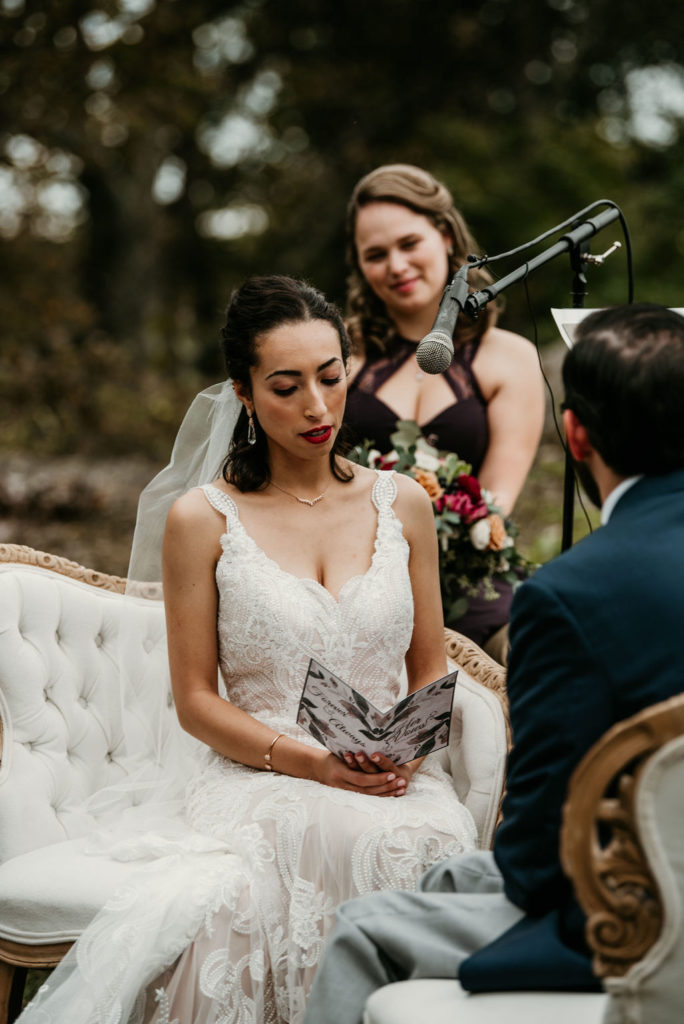 bride reading wedding vows