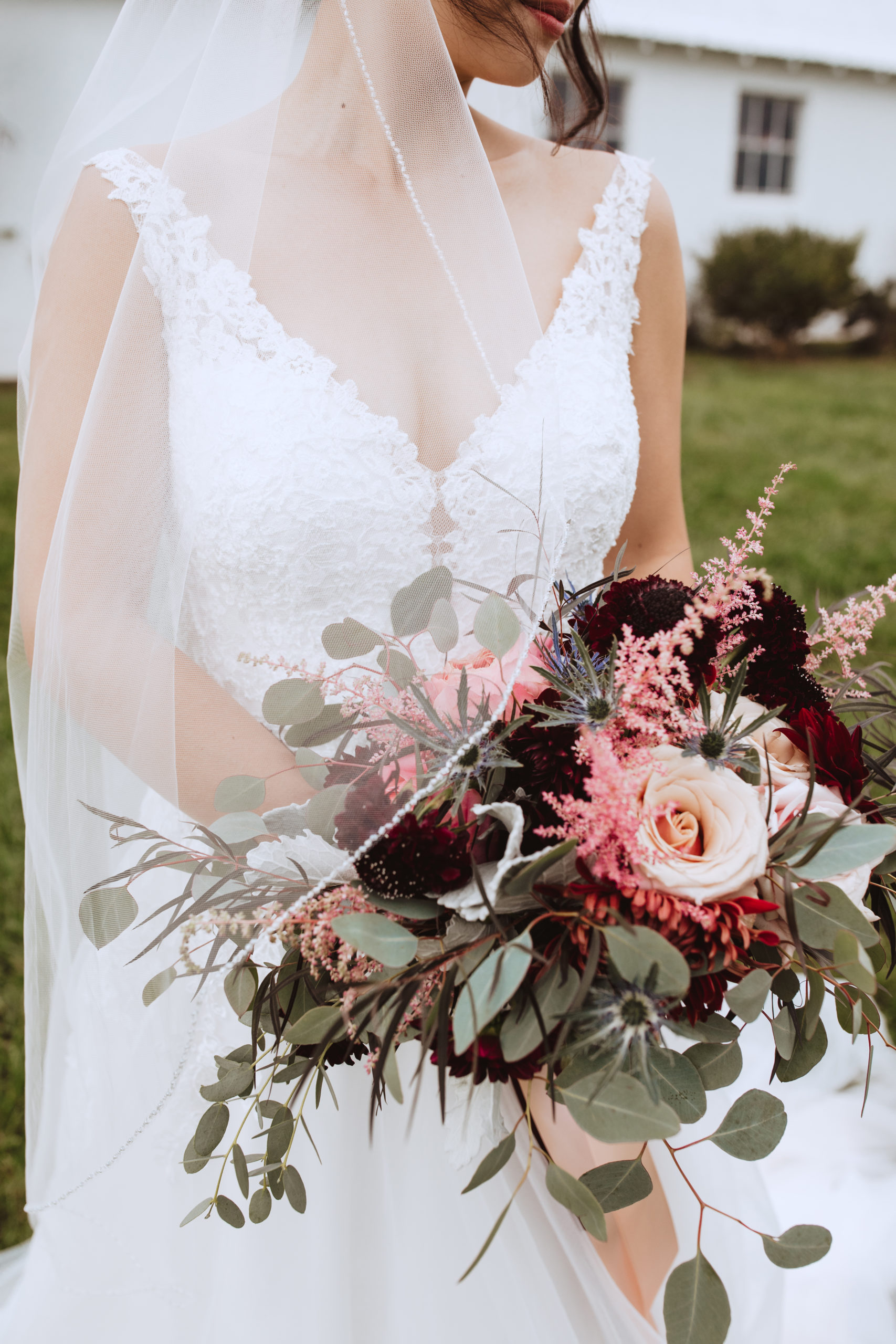 Fall bridal bouquet with burgundy and blush roses